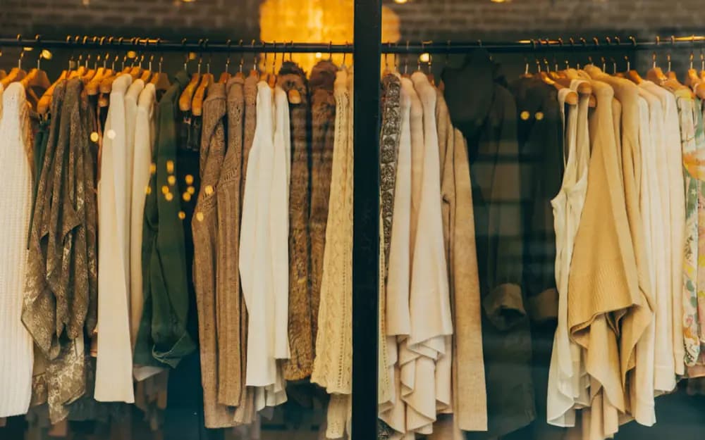 Fashion garments arranged on a clothing rail