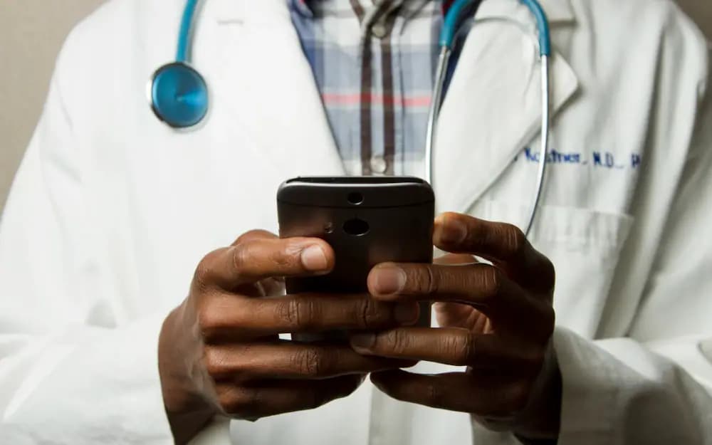 Healthcare professional using a mobile device